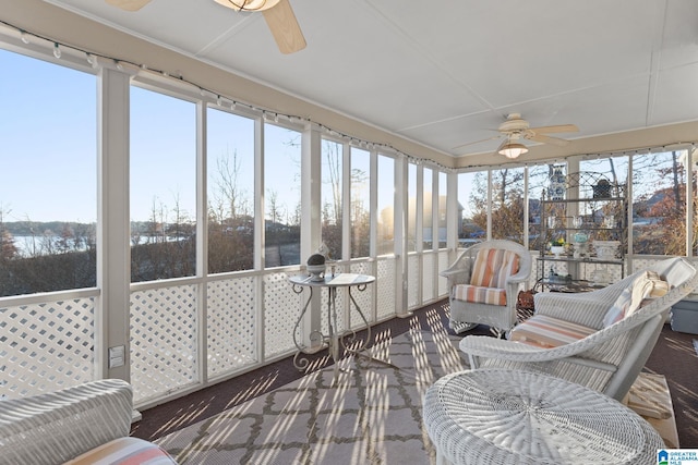 sunroom / solarium with ceiling fan