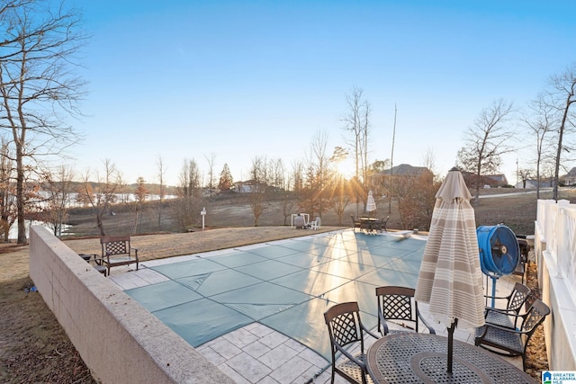 view of pool featuring a patio area