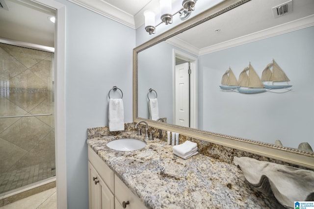 bathroom featuring crown molding, a shower with door, and vanity