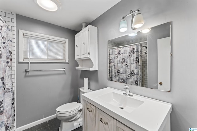 bathroom featuring tile patterned floors, toilet, vanity, and a shower with shower curtain