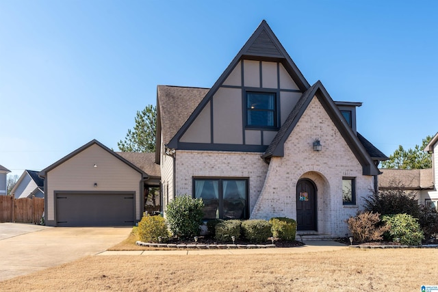 tudor home featuring a garage