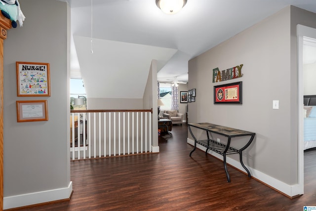 hallway with dark hardwood / wood-style floors