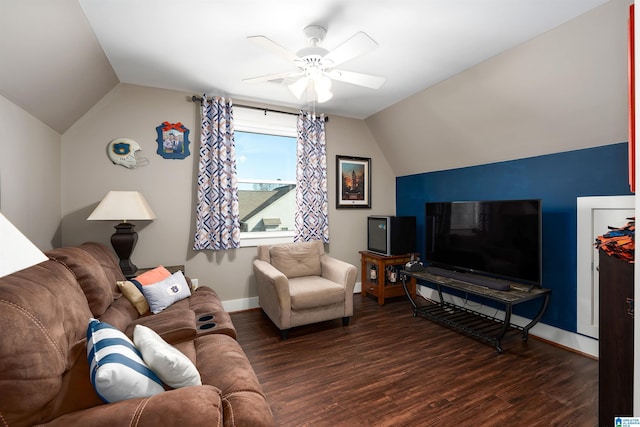 living room featuring vaulted ceiling, ceiling fan, and dark hardwood / wood-style flooring