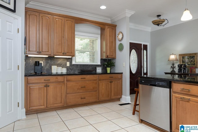 kitchen with decorative light fixtures, dishwasher, decorative backsplash, dark stone counters, and crown molding