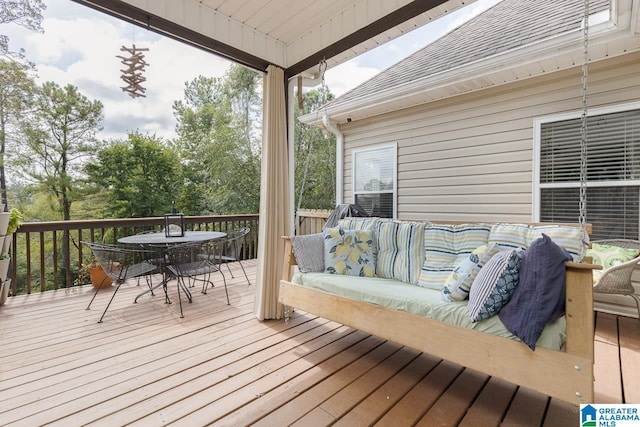 wooden deck featuring an outdoor living space