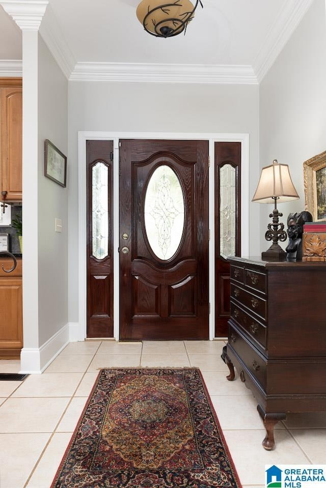 tiled entryway with crown molding