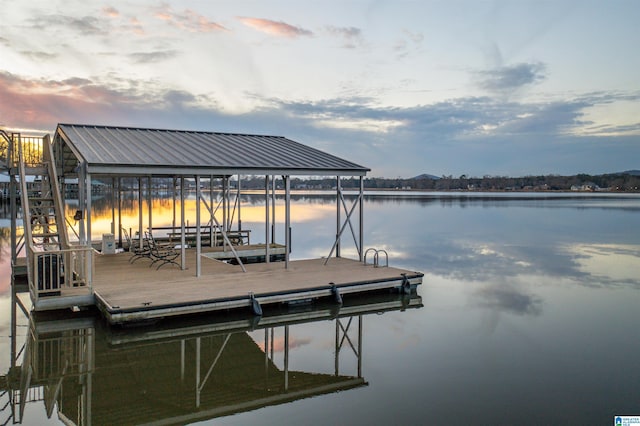 dock area with a water view