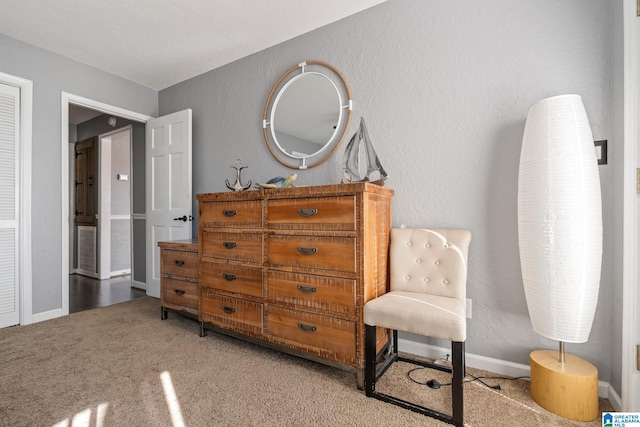 living area featuring light colored carpet