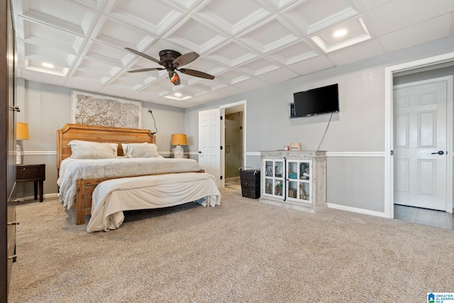 carpeted bedroom featuring ceiling fan and coffered ceiling