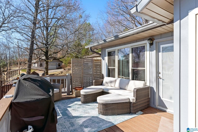 wooden deck with a grill