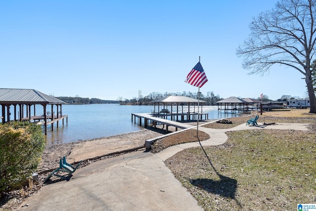 dock area featuring a gazebo and a water view