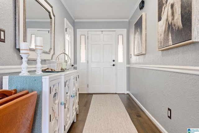 foyer featuring dark wood-type flooring and ornamental molding