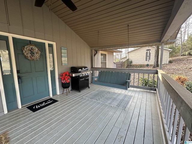 wooden terrace featuring area for grilling