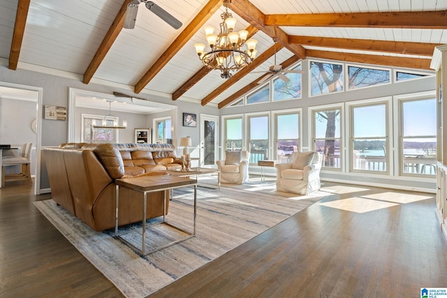 living room with beam ceiling, wood-type flooring, a water view, and ceiling fan with notable chandelier