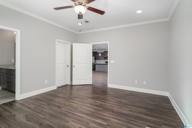 unfurnished bedroom featuring stainless steel refrigerator, ceiling fan, dark wood-type flooring, ensuite bathroom, and ornamental molding