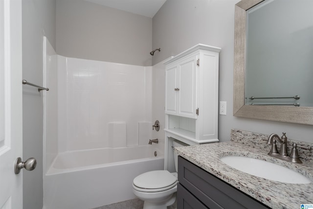 full bathroom with washtub / shower combination, vanity, and toilet