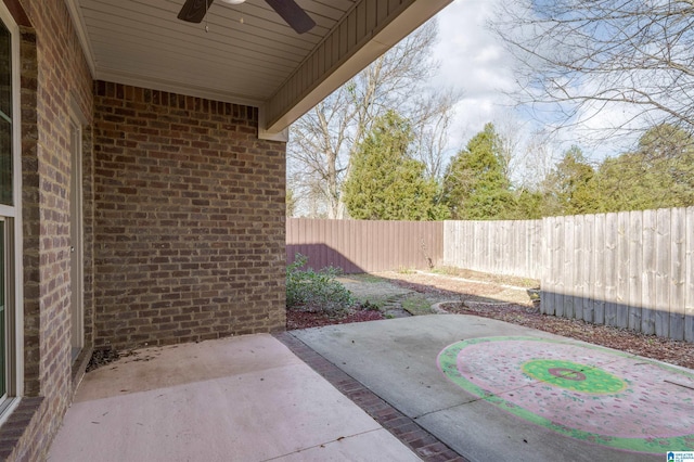 view of patio featuring ceiling fan