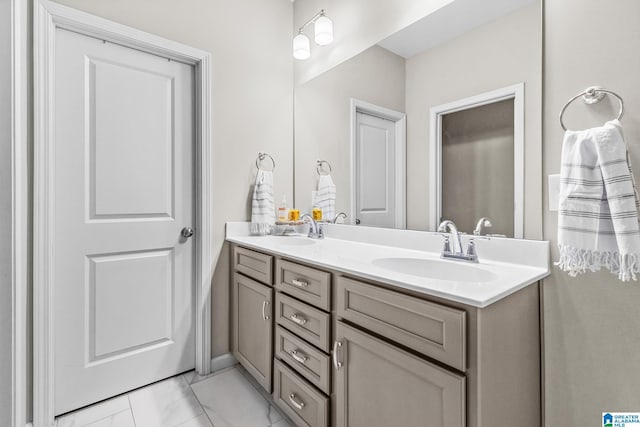 bathroom featuring vanity and tile patterned flooring