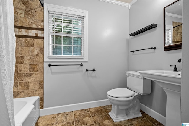 bathroom featuring shower / tub combo, toilet, and ornamental molding