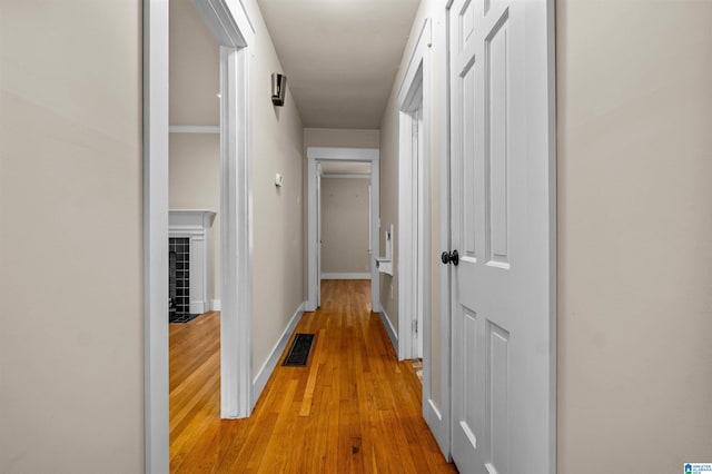 corridor featuring light wood-type flooring