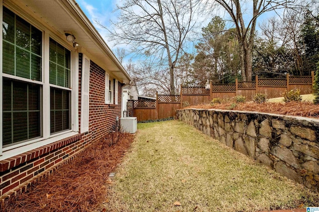 view of yard with central AC