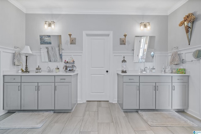 bathroom with vanity and crown molding