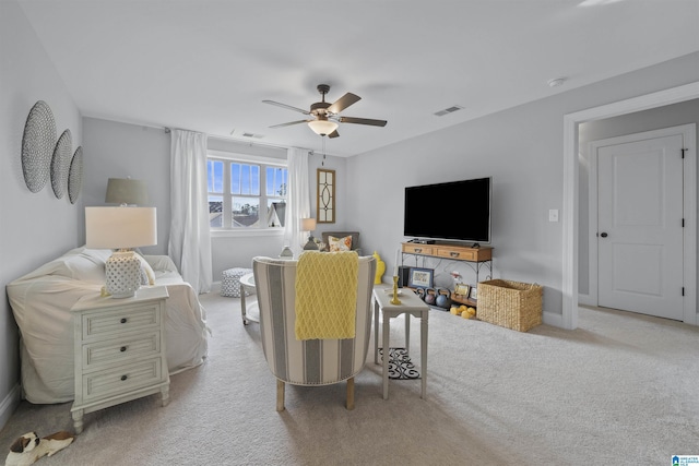 carpeted bedroom featuring ceiling fan