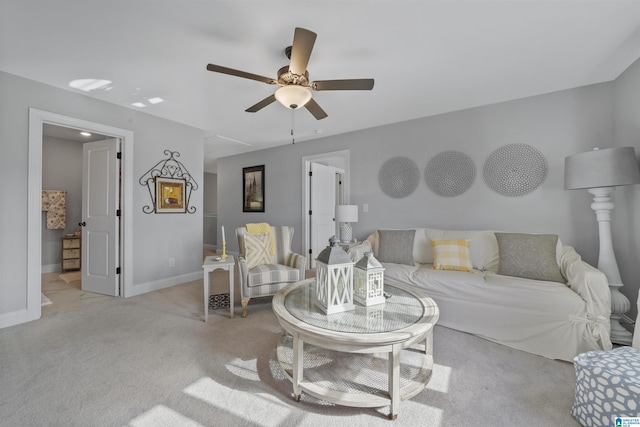 living room featuring ceiling fan and light carpet