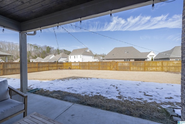 view of yard covered in snow