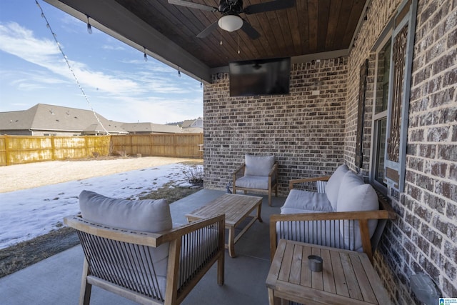 view of patio featuring ceiling fan and an outdoor living space