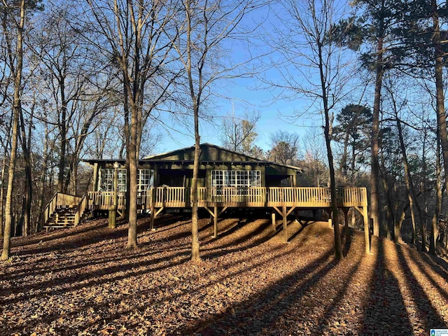 rear view of house with a deck