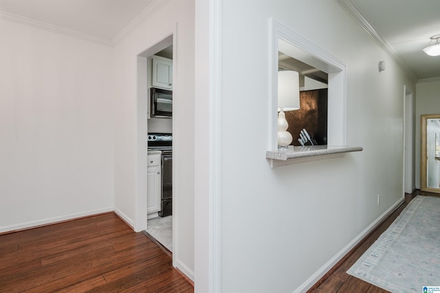 hallway with crown molding and dark wood-type flooring