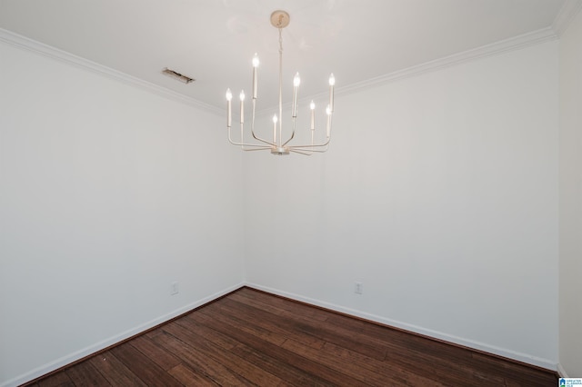 unfurnished room with hardwood / wood-style floors, a notable chandelier, and ornamental molding