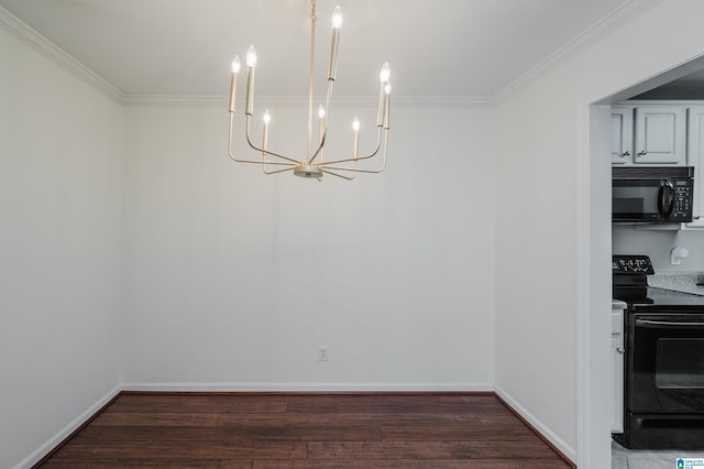 unfurnished dining area with ornamental molding, an inviting chandelier, and dark wood-type flooring