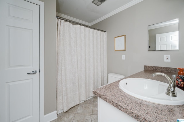 bathroom featuring crown molding, tile patterned flooring, vanity, and toilet