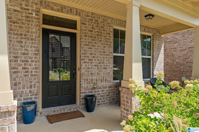 property entrance featuring a porch