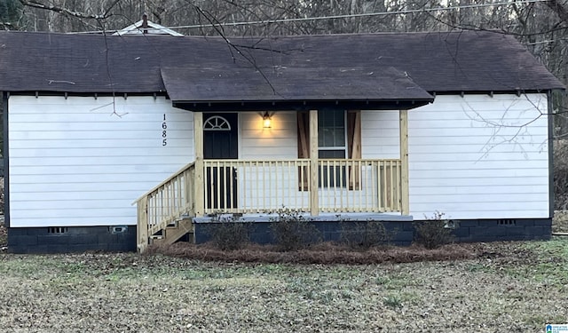 entrance to property with a porch