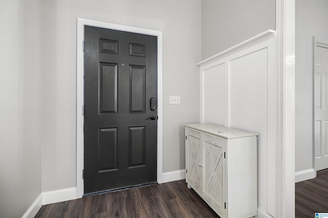 entryway with dark wood-type flooring