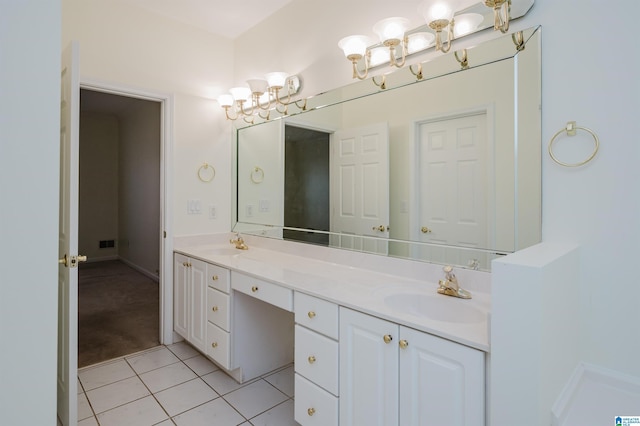 bathroom featuring tile patterned flooring and vanity