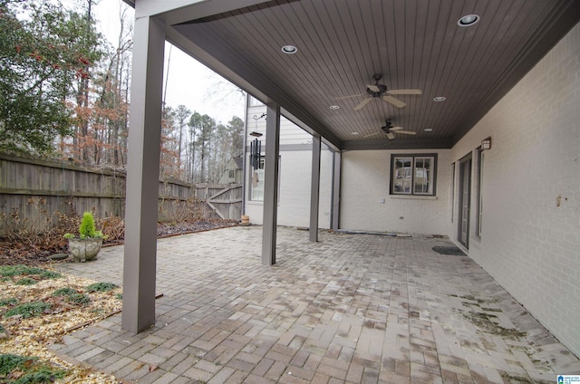 view of patio featuring ceiling fan