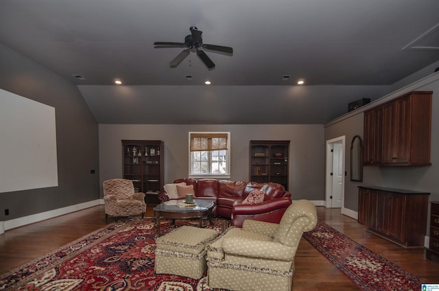 living room with vaulted ceiling, ceiling fan, and dark hardwood / wood-style flooring