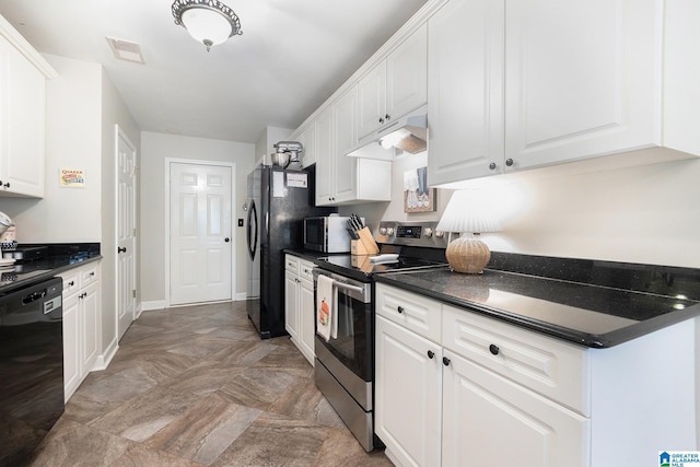 kitchen with white cabinets and black appliances