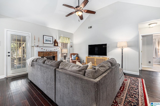 living room featuring a fireplace, high vaulted ceiling, ceiling fan, and dark hardwood / wood-style floors