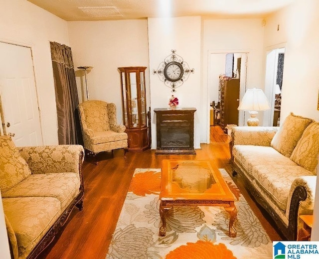 living area with dark wood-type flooring