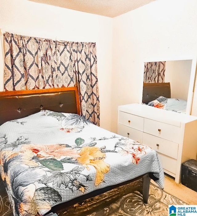 bedroom with a textured ceiling