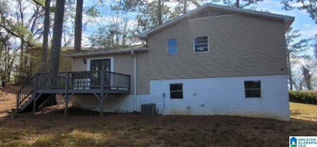 rear view of property with a deck