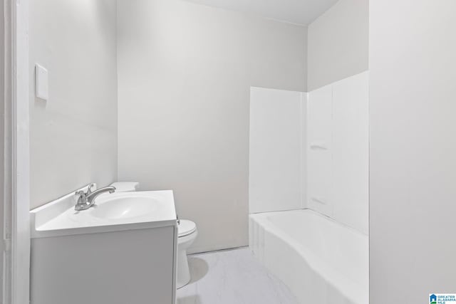 full bathroom with vanity, shower / bath combination, and toilet