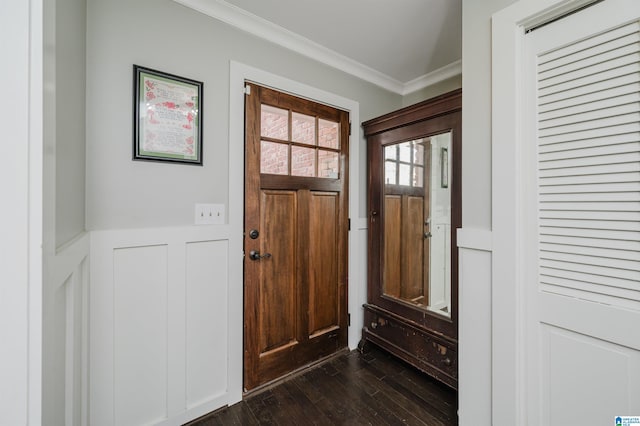 doorway to outside featuring ornamental molding and dark hardwood / wood-style floors