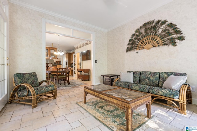 living room featuring light tile patterned flooring, ornamental molding, and a chandelier