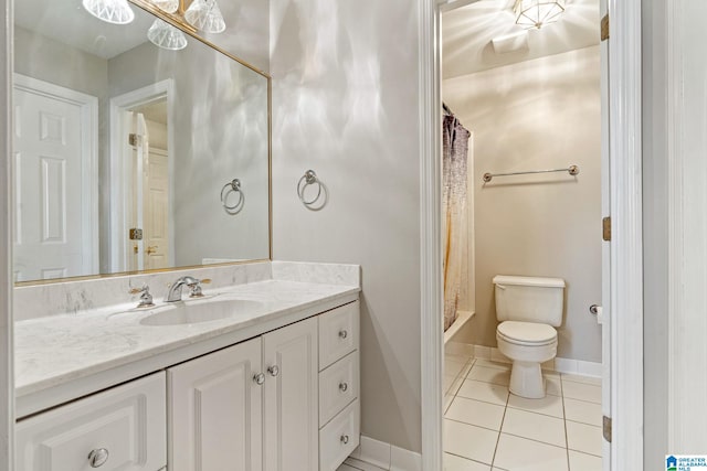 full bathroom featuring toilet, tile patterned flooring, vanity, and shower / tub combo with curtain